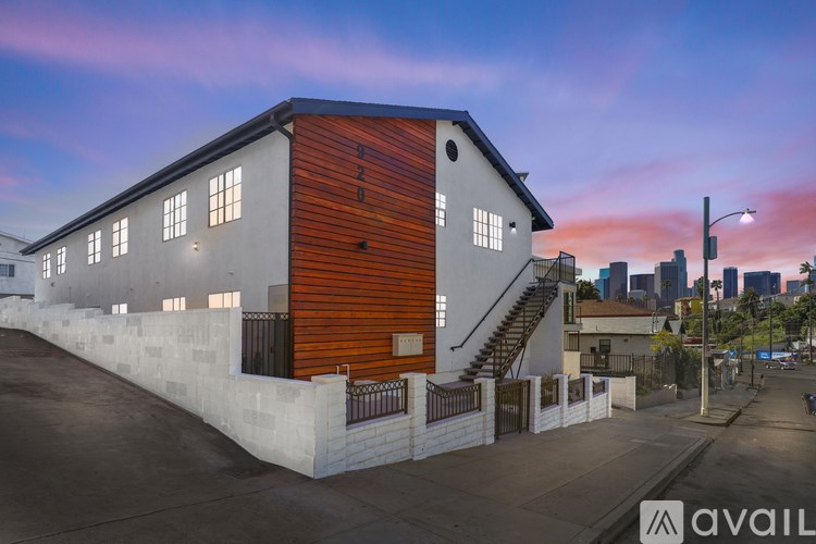 A modern building with a combination of white and wood paneling.
