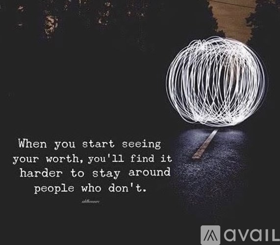 A quote about self-worth is displayed over a dark background with a single white light bulb.