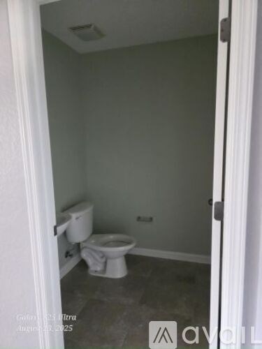 A small bathroom with a toilet and sink.