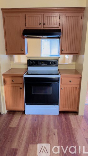 A kitchen with a stove and oven.