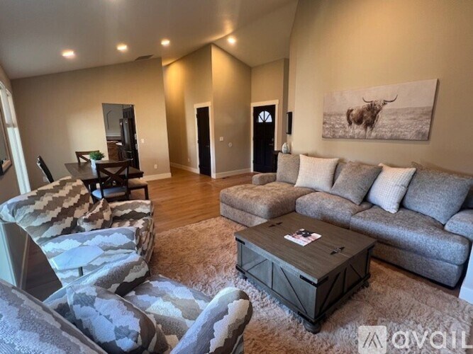 A walk-in closet with white shelves and hangers.