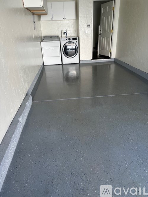 A laundry room with a washer and dryer.