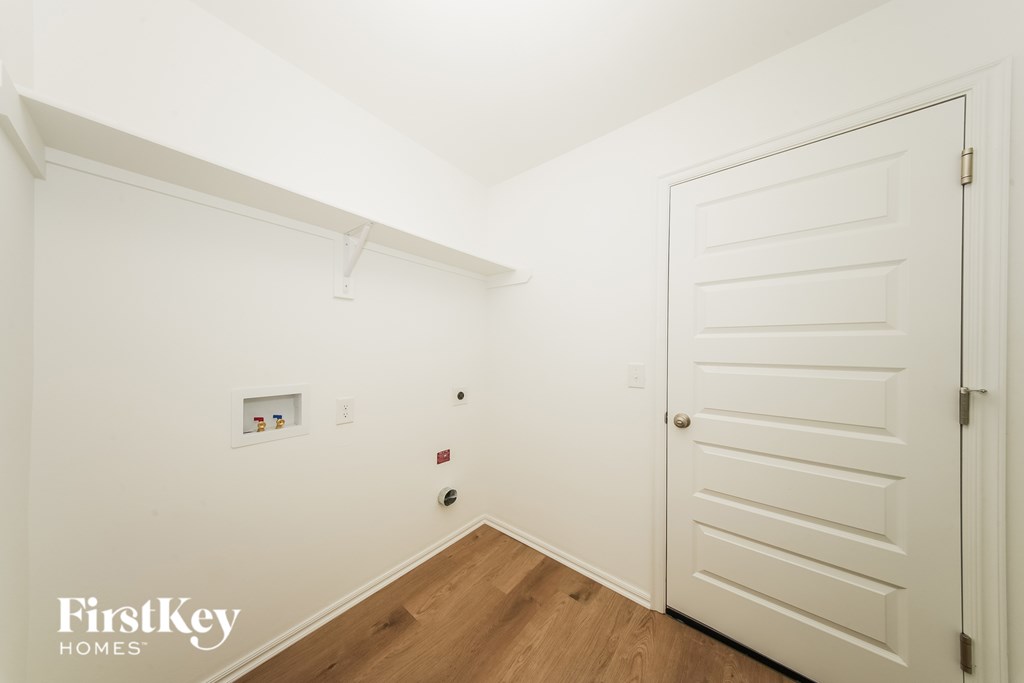 A white door is on the right side of the image.