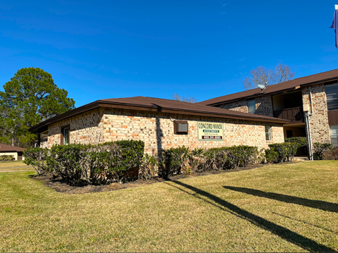 A building with a sign that reads "Welcome to Hillcrest Elementary School" is shown.