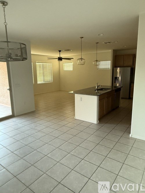A basketball court with a hoop and a backboard.