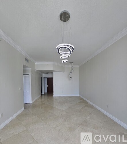 A bathroom with two sinks and a toilet.