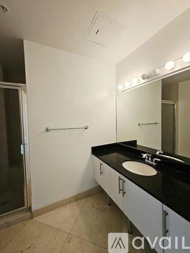 A living room with a view of the city.