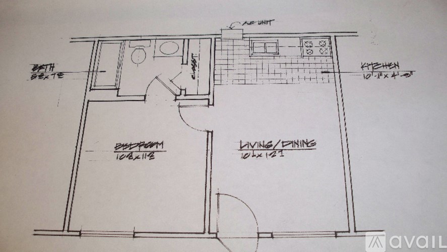 A floor plan of a living space with a kitchen and bathroom.