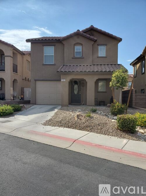 A house with a driveway in front of it.