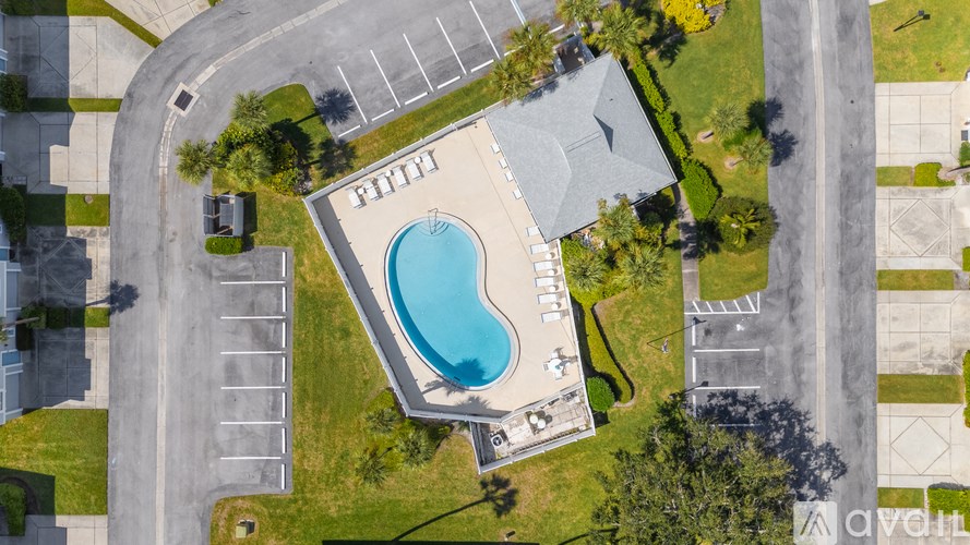 An aerial view of a marina with boats and buildings.