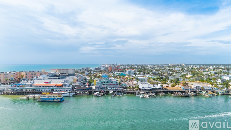 A view of a harbor with boats and buildings.