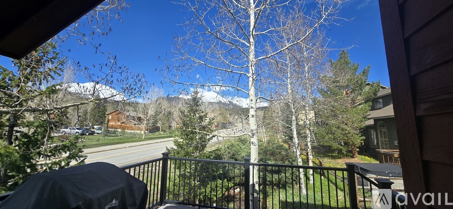 A house with a tree in front of it.