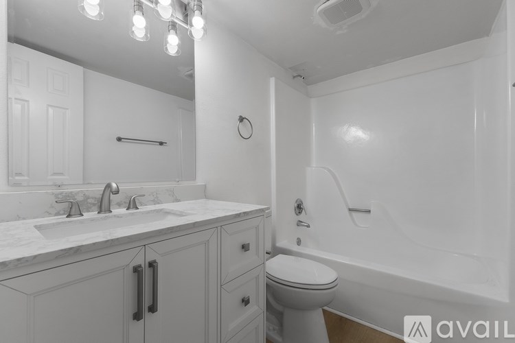 A floor plan of a 2nd level townhome with a laundry area and closets.