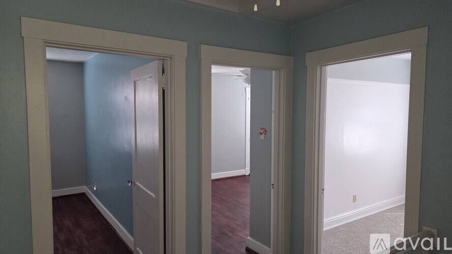 A room with a door and a window.