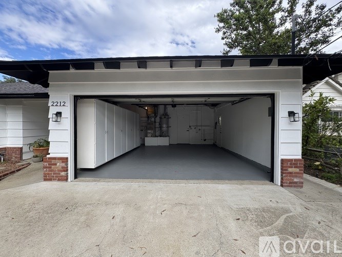 A garage with the number 2212 on the wall.