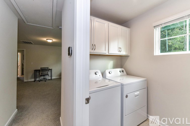 A laundry room with a washer and dryer.