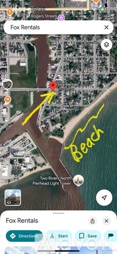 A map application is open, showing a location near a beach.