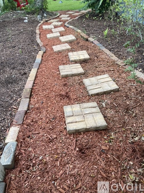 A garden path with stepping stones.