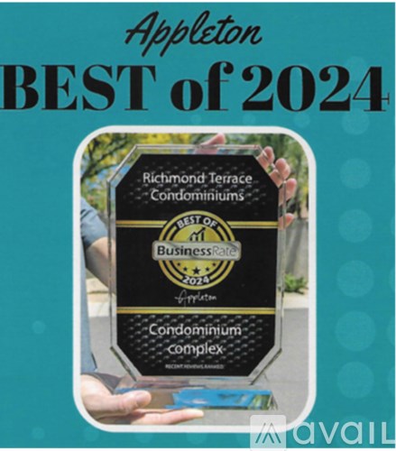 A person is holding a plaque that says "Best of 2024" and "Richmond Terrace Condominiums".