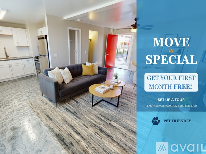 A living room with a couch, coffee table, and a sign offering a free first month of service.