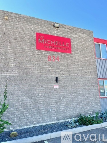 The sign on the building says Michelle on Rossevelt.