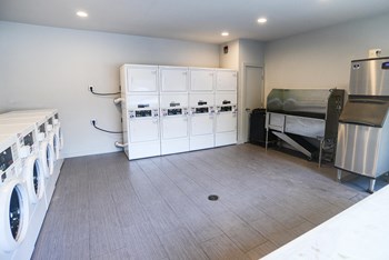 Laundry room in our east riverside apartments - Photo Gallery 9
