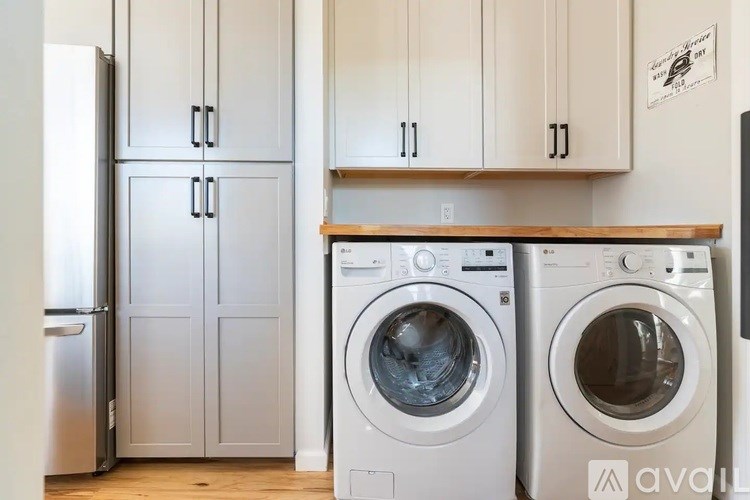 A laundry room with a washer and dryer.