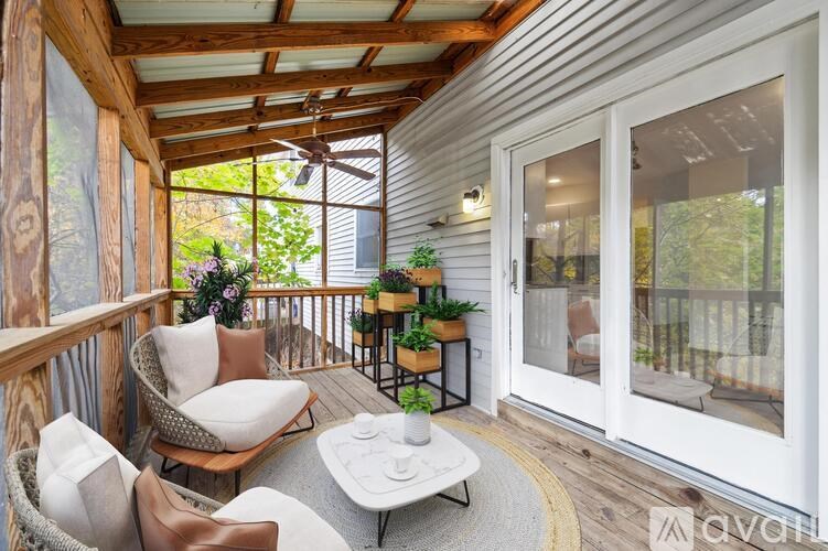 A patio with a table and chairs is shown.