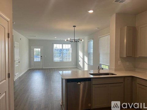 A kitchen with a dishwasher and a sink.