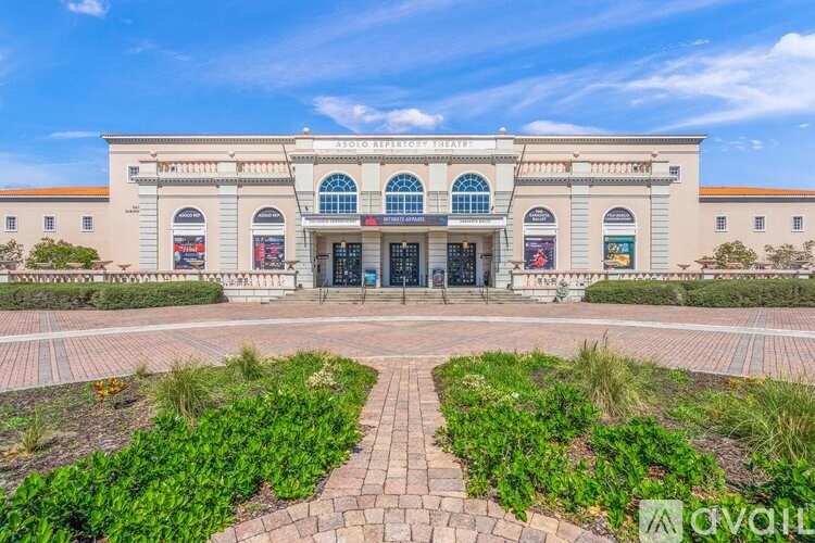 A large building with a sign that says "STO" on it.
