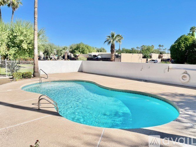 A small pool with a metal ladder.