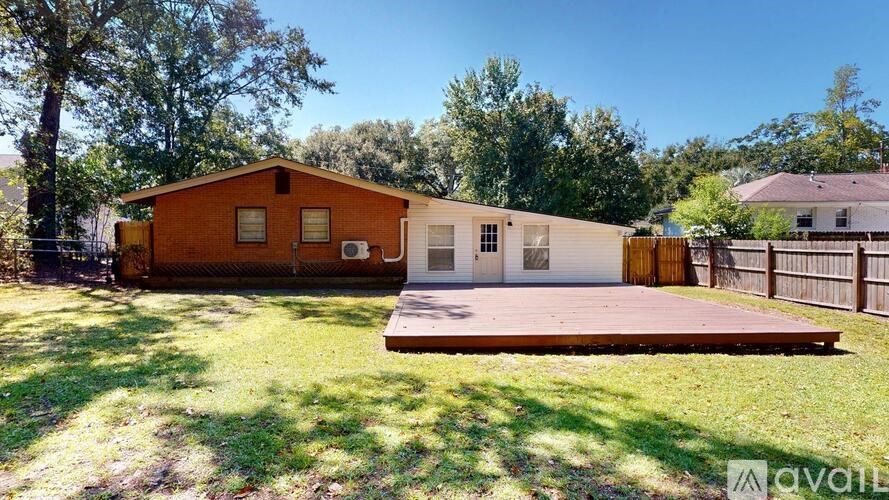 A house with a brown exterior is for sale.