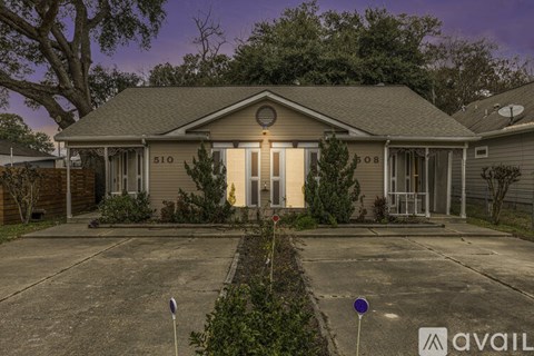 A house with the number 510 on it is for sale.