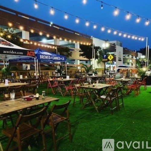 A patio with tables and chairs is set up for dining.