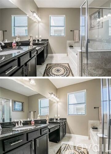 A modern bathroom with a black and white color scheme.