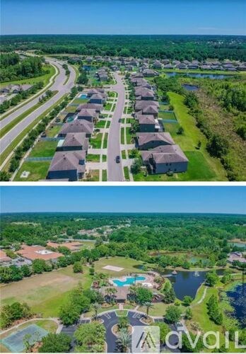 A bird's eye view of a residential area with houses and a swimming pool.