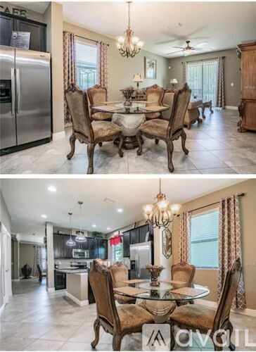 A dining room with a glass table and chairs.