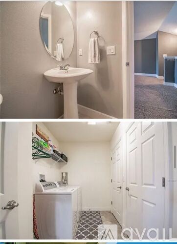A bathroom with a sink, mirror, and towel rack.
