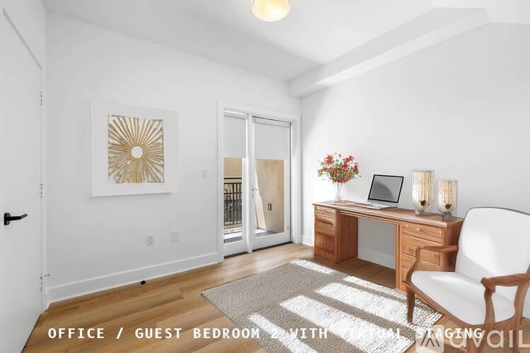 A room with a desk and a chair in it.