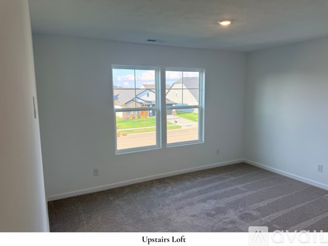 A white toilet and sink in a small bathroom.