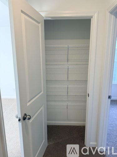 A white door with a glass panel in the middle.