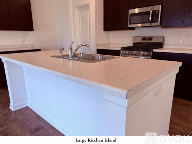 A modern gas stove with a digital display and control knobs.