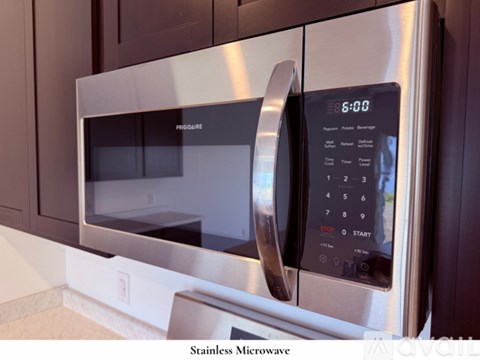 A kitchen sink with a faucet and a countertop.