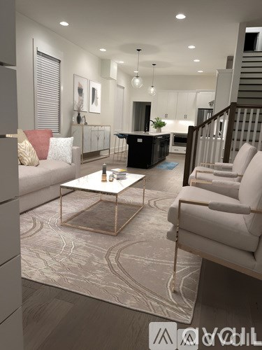 A modern living room with a white sofa and a coffee table.