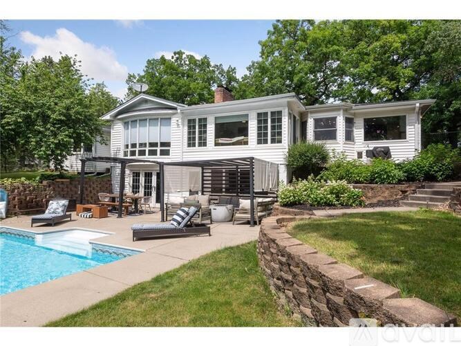 A house with a pool in the backyard.