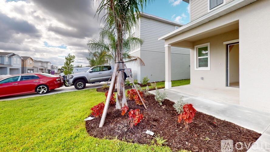 A garage with the number 19565 on the wall.