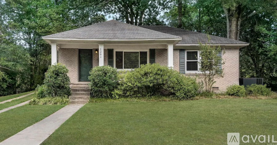 A house with a front yard and a sign that says "available".