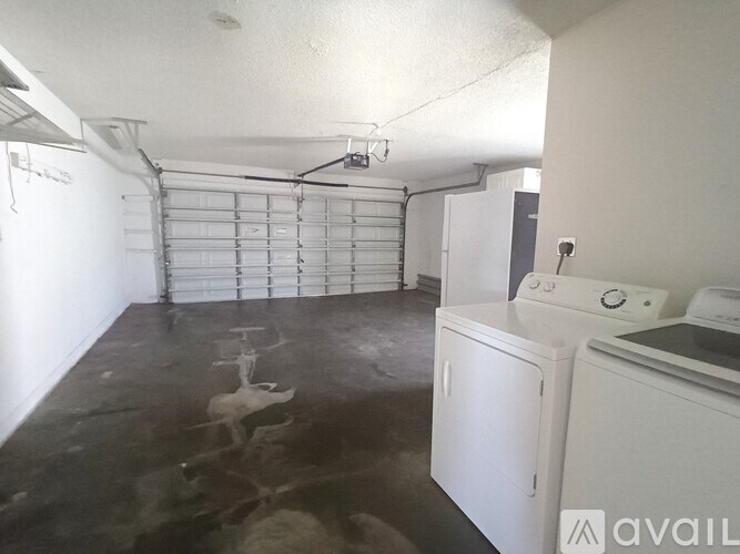 A laundry room with a washer and dryer.