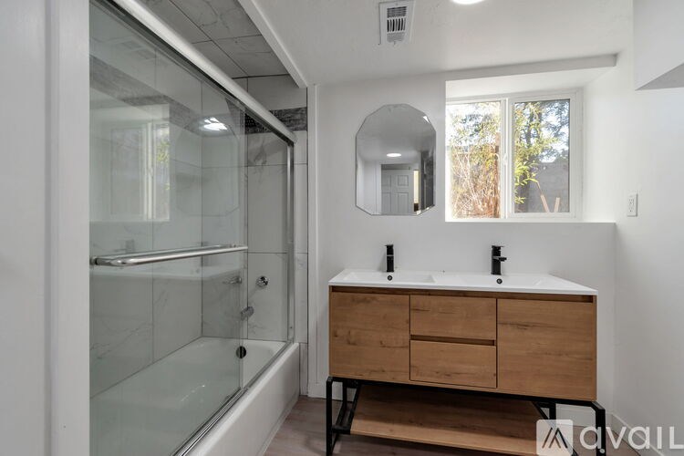 A room with a door and a window.