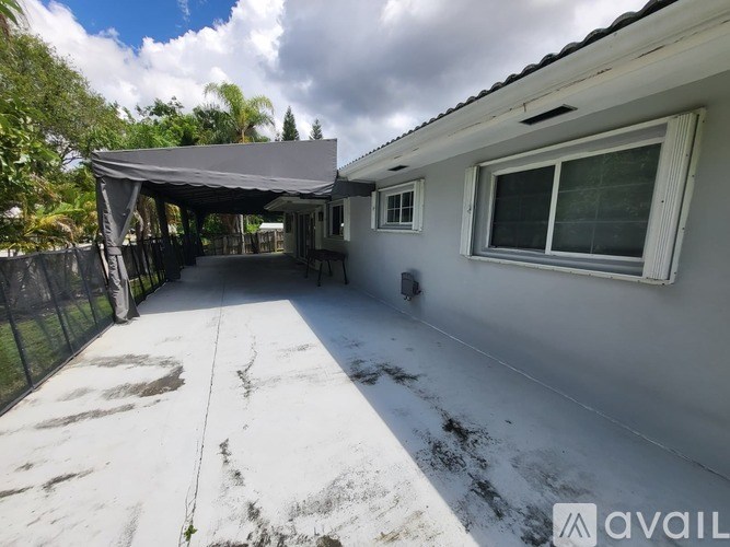 A house with a covered patio area.